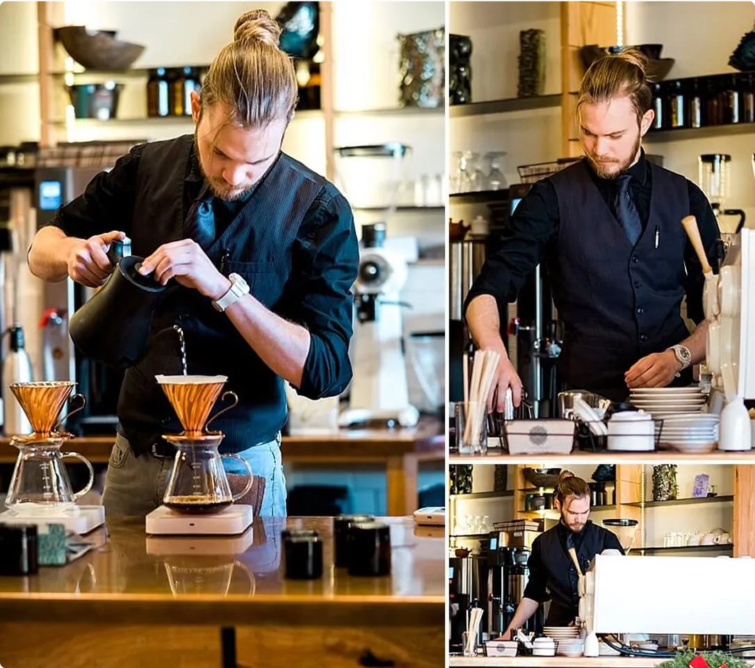 man pouring a pour over in a coffee shop